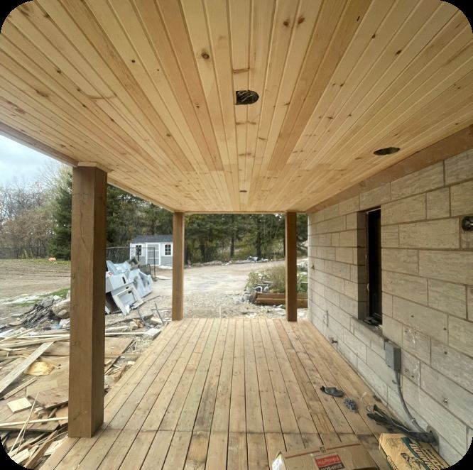 Covered deck with a tongue-and-groove wood ceiling