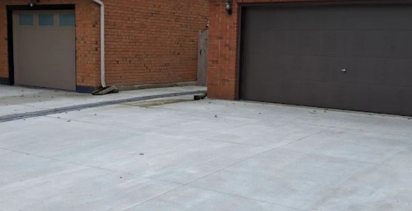 Concrete garage apron and pad
